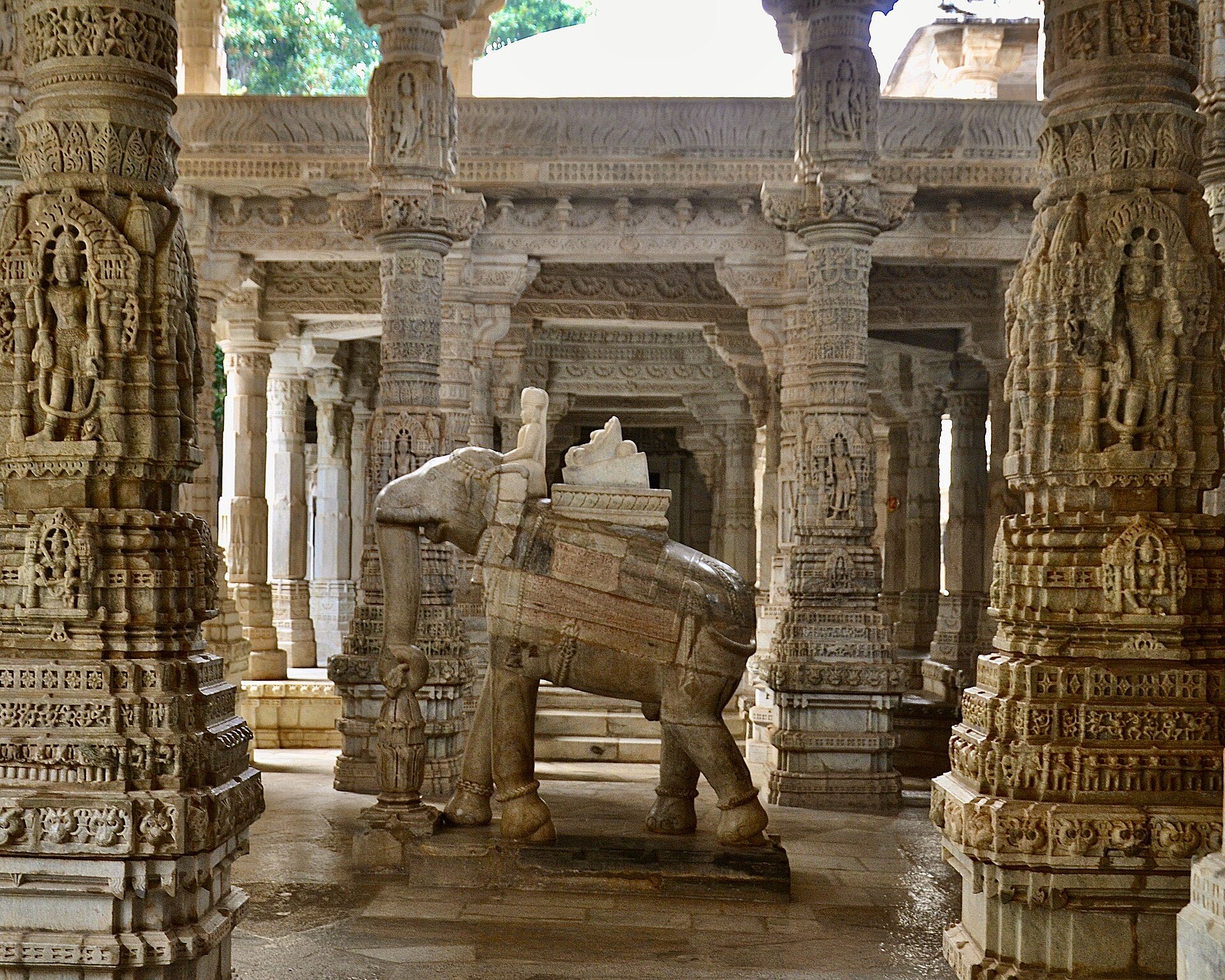 The intricately carved white marble pillars and domes inside the Ranakpur Jain temple